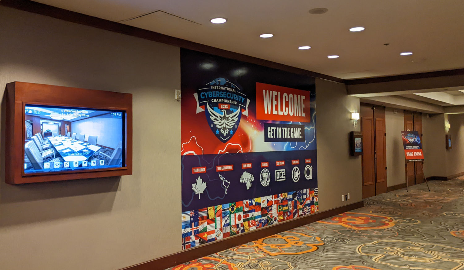 Large poster with ICC 2023 logo and text saying 'WELCOME' and 'GET IN THE GAME.'